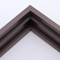 This stair step floating canvas frame has a matte espresso finish and subtle wood grain detailing. The canvas will hover neatly, resting on the lowest, flat edge.  

Give an authentic, fine art display to your favourite canvas Giclée print or acrylic painting. This canvas floater is ideal for medium to extra large canvases on thick (1.5 " deep) stretcher bars.

*Note: These solid wood, custom canvas floaters are for stretched canvas prints and paintings, and raised wood panels.