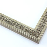Slim, silver picture frame with classic decorative carving